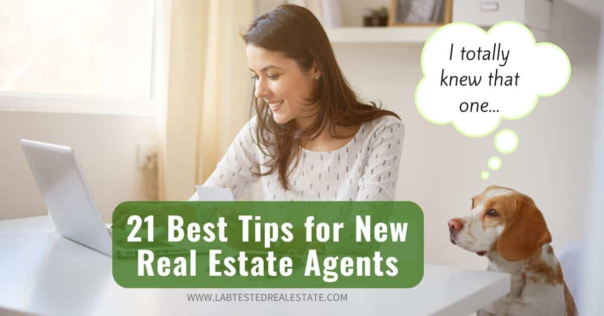 New agent looking at real estate tips on a laptop with her dog.